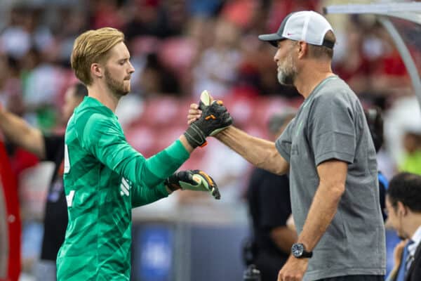 SINGAPORE - Sunday, July 30, 2023: Liverpool's goalkeeper Caoimhin Kelleher (L) shakes hands with manager Jürgen Klopp after being substituted during a pre-season friendly match between Liverpool FC and Leicester City FC at the Singapore National Stadium. (Pic by David Rawcliffe/Propaganda)