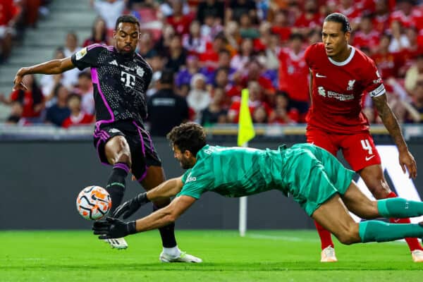 SINGAPORE - Wednesday, August 2, 2023: Liverpool's goalkeeper Alisson Becker makes a save from Bayern Munich's Ryan Gravenberch during a pre-season friendly match between Liverpool FC and FC Bayern Munich FC at the Singapore National Stadium. Bayern won 4-3. (Credit: Singapore Festival of Football)