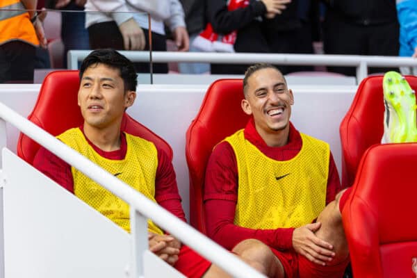 LIVERPOOL, ENGLAND - Saturday, August 19, 2023: Liverpool substitutes Water Endo (L) and Kostas Tsimikas on the bench before the FA Premier League match between Liverpool FC and AFC Bournemouth at Anfield. Liverpool won 3-1. (Pic by David Rawcliffe/Propaganda)