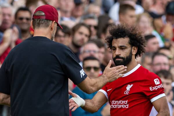 LIVERPOOL, ENGLAND - Saturday, August 19, 2023: Liverpool's Mohamed Salah shakes hands with manager Jürgen Klopp as he is substituted during the FA Premier League match between Liverpool FC and AFC Bournemouth at Anfield. Liverpool won 3-1. (Pic by David Rawcliffe/Propaganda)