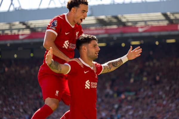 LIVERPOOL, ENGLAND - Saturday, September 2, 2023: Liverpool's Dominik Szoboszlai (R) celebrates with team-mate Curtis Jones after scoring the opening goal during the FA Premier League match between Liverpool FC and Aston Villa FC at Anfield. Liverpool won 3-0. (Pic by David Rawcliffe/Propaganda)