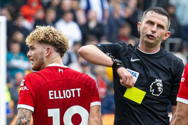 WOLVERHAMPTON, ENGLAND - Saturday, September 16, 2023: Liverpool's Harvey Elliott (L) is shown a yellow card by referee Michael Oliver after celebrating with supporters after scoring the third goal during the FA Premier League match between Wolverhampton Wanderers FC and Liverpool FC at Molineux Stadium. Liverpool won 3-1. (Pic by David Rawcliffe/Propaganda)