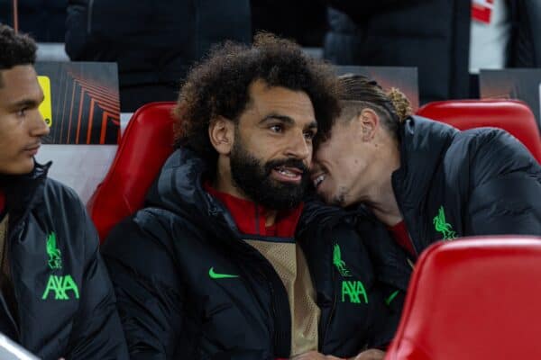 LIVERPOOL, ENGLAND - Thursday, October 26, 2023: Liverpool's substitute Kostas Tsimikas (R) whispers into the ear of Mohamed Salah on the bench before the UEFA Europa League Group E match-day 3 game between Liverpool FC and Toulouse FC at Anfield. Liverpool won 5-1. (Photo by David Rawcliffe/Propaganda)