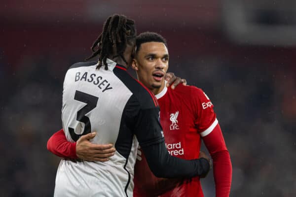 LIVERPOOL, ENGLAND - Sunday, December 3, 2023: Liverpool's Trent Alexander-Arnold (R) embraces Fulham's Calvin Bassey after the FA Premier League match between Liverpool FC and Fulham FC at Anfield. Liverpool won 4-3. (Photo by David Rawcliffe/Propaganda)