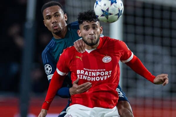 EINDHOVEN, THE NETHERLANDS - Tuesday, December 12, 2023: PSV Eindhoven's Ricardo Pepi (R) is challenged by Arsenal's Gabriel Magalhães during the UEFA Champions League Group B game between PSV Eindhoven and Arsenal FC at the Philips Stadion. The game ended in a 1-1 draw. (Photo by David Rawcliffe/Propaganda)