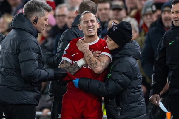 LIVERPOOL, ENGLAND - Saturday, December 23, 2023: Liverpool's Kostas Tsimikas is treated for a broken collarbone during the FA Premier League match between Liverpool FC and Arsenal FC at Anfield. (Photo by David Rawcliffe/Propaganda)