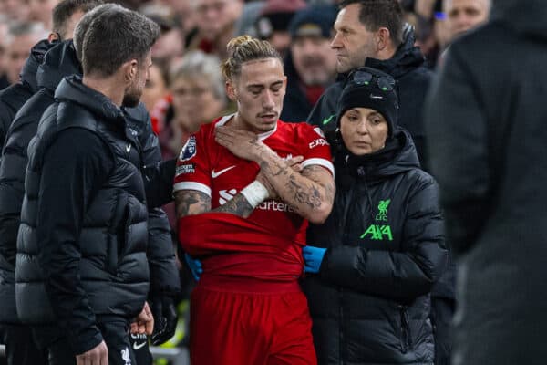 LIVERPOOL, ENGLAND - Saturday, December 23, 2023: Liverpool's Kostas Tsimikas is treated for a broken collarbone during the FA Premier League match between Liverpool FC and Arsenal FC at Anfield. (Photo by David Rawcliffe/Propaganda)