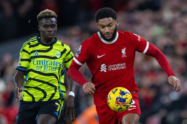 LIVERPOOL, ENGLAND - Saturday, December 23, 2023: Liverpool's Joe Gomez (R) and Arsenal's Bukayo Saka during the FA Premier League match between Liverpool FC and Arsenal FC at Anfield. (Photo by David Rawcliffe/Propaganda)