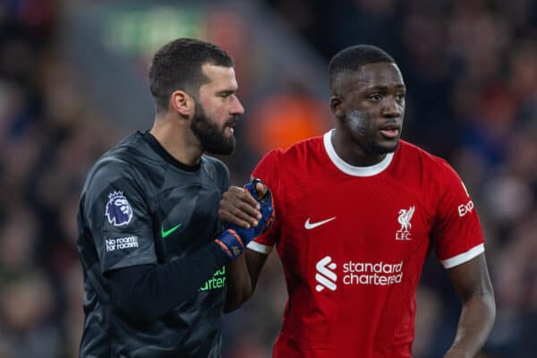 LIVERPOOL, ENGLAND - Saturday, December 23, 2023: Liverpool's goalkeeper Alisson Becker (L) and Ibrahima Konaté during the FA Premier League match between Liverpool FC and Arsenal FC at Anfield. (Photo by David Rawcliffe/Propaganda)