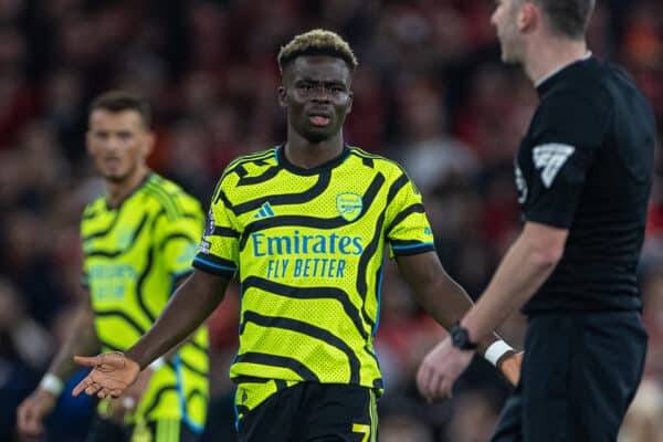 LIVERPOOL, ENGLAND - Saturday, December 23, 2023: Arsenal's Bukayo Saka looks towards the referee as he escapes a second yellow card during the FA Premier League match between Liverpool FC and Arsenal FC at Anfield. (Photo by David Rawcliffe/Propaganda)