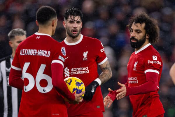 LIVERPOOL, ENGLAND - Monday, January 1, 2024: Liverpool's Trent Alexander-Arnold (L) hands the ball to Mohamed Salah before a penalty kick during the FA Premier League match between Liverpool FC and Newcastle United FC on New Year's Day at Anfield. Liverpool won 4-2. (Photo by David Rawcliffe/Propaganda)