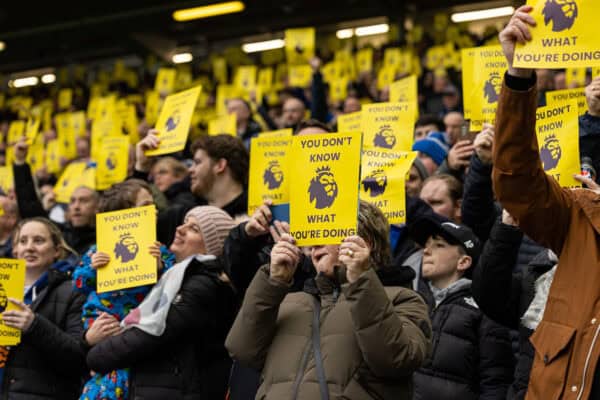 LIVERPOOL, ENGLAND - Saturday, February 3, 2024: Everton supporters with yellow cards "You Don't Know What You're Doing" printed on them, as they protest against the Premier League's 10-point deduction for breaking Profit & Sustainability rules, during the FA Premier League match between Everton FC and Tottenham Hotspur FC at Goodison Park. The game ended in a 2-2 draw. (Photo by David Rawcliffe/Propaganda)