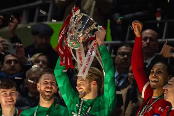LONDON, ENGLAND - Sunday, February 25, 2024: Liverpool's goalkeeper Caoimhin Kelleher lifts the trophy after the Football League Cup Final match between Chelsea FC and Liverpool FC at Wembley Stadium. (Photo by Peter Powell/Propaganda)