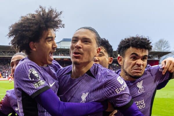 NOTTINGHAM, ENGLAND - Saturday, March 2, 2024: Liverpool's Darwin Núñez (C) celebrates with team-mates (L) Jayden Danns and Luis Díaz (R) after scoring the winning goal in the ninth minute of injury time during the FA Premier League match between Nottingham Forest FC and Liverpool FC at the City Ground. Liverpool won 1-0. (Photo by David Rawcliffe/Propaganda)