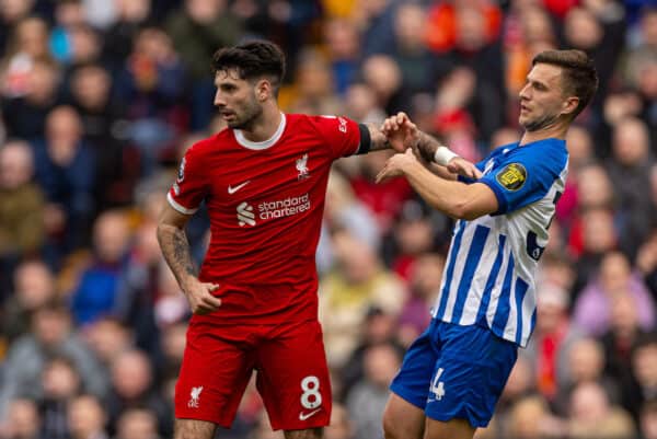 LIVERPOOL, ENGLAND - Sunday, March 31, 2024: Liverpool's Dominik Szoboszlai (L) and Brighton & Hove Albion's Simon Adingra during the FA Premier League match between Liverpool FC and Brighton & Hove Albion FC at Anfield. Liverpool won 2-1. (Photo by David Rawcliffe/Propaganda)