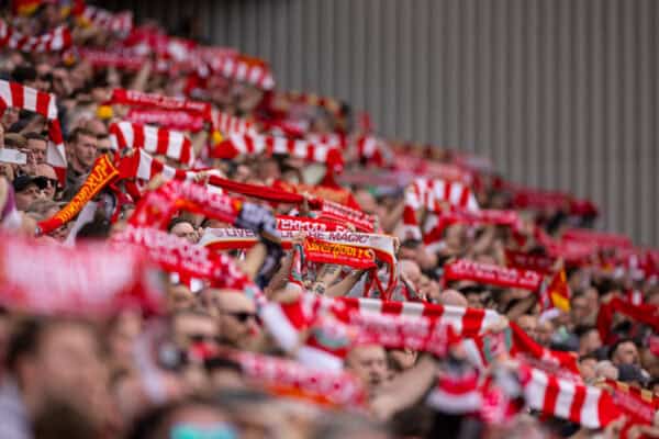 LIVERPOOL, ENGLAND - Sunday, May 5, 2024: Liverpool supporter sing "You'll Never Walk Alone" before the FA Premier League match between Liverpool FC and Tottenham Hotspur FC at Anfield. Liverpool won 4-2. (Photo by Ryan Brown/Propaganda)