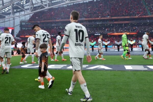 DUBLIN, IRELAND - MAY 22: A general view of the inside of the stadium as Florian Wirtz of Bayer 04 Leverkusen walks out of the tunnel with a mascot prior to the UEFA Europa League 2023/24 final match between Atalanta BC and Bayer 04 Leverkusen at Dublin Arena on May 22, 2024 in Dublin, Ireland. (Handout photo from UEFA)