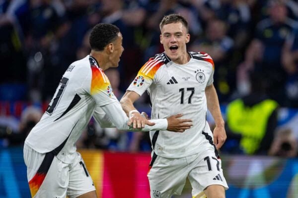 MUNICH, GERMANY - Friday, June 14, 2024: Germany's Florian Wirtz (R) celebrates after scoring the opening goal during the opening UEFA Euro 2024 Group A match between Germany and Scotland at the Allianz Arena. Germany won 5-1. (Photo by David Rawcliffe/Propaganda)