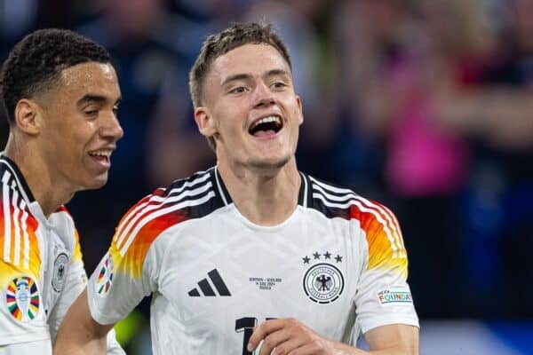 MUNICH, GERMANY - Friday, June 14, 2024: Germany's Florian Wirtz (R) celebrates with team-mate Jamal Musiala after scoring the opening goal during the opening UEFA Euro 2024 Group A match between Germany and Scotland at the Allianz Arena. Germany won 5-1. (Photo by David Rawcliffe/Propaganda)