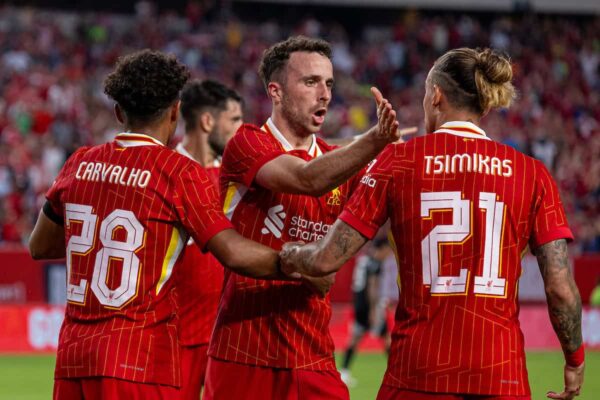PHILADELPHIA - Wednesday, July 31, 2024: Liverpool's Fábio Carvalho (L) celebrates with team-mates Diogo Jota (C) and Kostas Tsimikas (R) after scoring the second goal during a pre-season friendly match between Liverpool FC and Arsenal FC at the Lincoln Financial Field on day eight of the club's pre-season tour of the USA. Liverpool won 2-1. (Photo by David Rawcliffe/Propaganda)