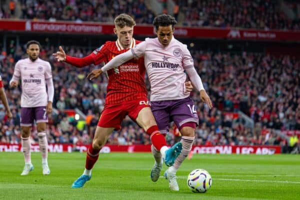 LIVERPOOL, ENGLAND - Sunday, August 25, 2024: Liverpool's Conor Bradley (L) challenges Fábio Carvalho during the FA Premier League match between Liverpool FC and Brentford FC at Anfield. Liverpool won 2-0. (Photo by David Rawcliffe/Propaganda)