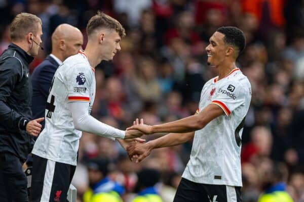 MANCHESTER, ENGLAND - Sunday, September 1, 2024: Liverpool's Trent Alexander-Arnold (R) is replaced by substitute Conor Bradley during the FA Premier League match between Manchester United FC and Liverpool FC at Old Trafford. Liverpool won 3-0. (Photo by David Rawcliffe/Propaganda)