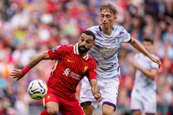 LIVERPOOL, ENGLAND - Saturday, September 21, 2024: Liverpool's Mohamed Salah (L) is challenged by AFC Bournemouth's Dean Huijsen during the FA Premier League match between Liverpool FC and AFC Bournemouth at Anfield. Liverpool won 3-0. (Photo by David Rawcliffe/Propaganda)