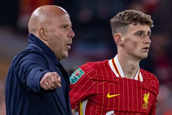 LIVERPOOL, ENGLAND - Wednesday, September 25, 2024: Liverpool's head coach Arne Slot speaks to substitute Tyler Morton during the Football League Cup 3rd Round match between Liverpool FC and West Ham United FC at Anfield. Liverpool won 5-1. (Photo by Ryan Brown/Propaganda)