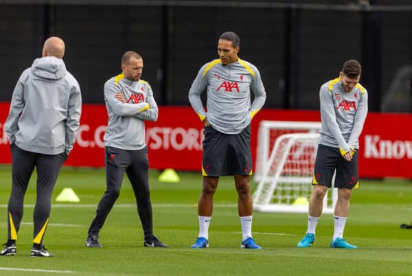 LIVERPOOL, ENGLAND - Tuesday, October 1, 2024: Liverpool's (L-R) goalkeeping coach John Achterberg, captain Virgil van Dijk and Andy Robertson during a training session at the AXA Training Centre ahead of the UEFA Champions League match between Liverpool FC and Bologna FC. (Photo by David Rawcliffe/Propaganda)