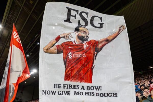 LIVERPOOL, ENGLAND - Wednesday, November 27, 2024: Liverpool supporters' banner for Mohamed Salah on the Spion Kop "He Fires A Bow! Now Give Mo His Dough" before the UEFA Champions League game between Liverpool FC and Real Madrid CF at Anfield. (Photo by David Rawcliffe/Propaganda)