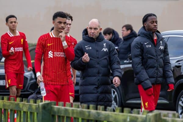 LIVERPOOL, ENGLAND - Saturday, November 30, 2024: Liverpool's head coach Marc Bridge-Wilkinson (R) speaks with Clae Ewing during the Under-18 Premier League match between Everton FC Under-18's and Liverpool FC Under-18's. the Mini-Mini-Merseyside Derby, at Finch Farm. (Photo by David Rawcliffe/Propaganda)