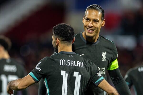 GIRONA, SPAIN - Tuesday, December 10, 2024: Liverpool's Mohamed Salah (L) celebrates with team-mate captain Virgil van Dijk after scoring the winning goal from a penalty-kick during the UEFA Champions League game between Girona FC and Liverpool FC at the Estadi Montilivi. Liverpool won 1-0. (Photo by David Rawcliffe/Propaganda)