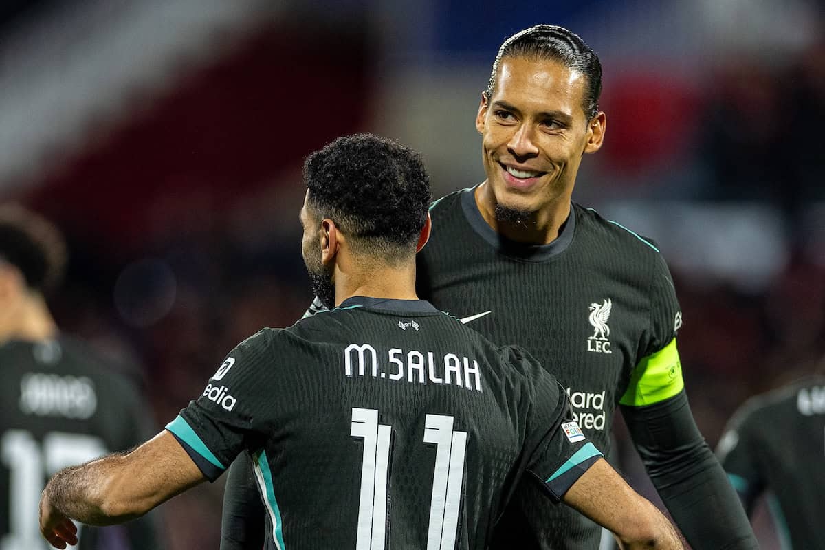 GIRONA, SPAIN - Tuesday, December 10, 2024: Liverpool's Mohamed Salah (L) celebrates with team-mate captain Virgil van Dijk after scoring the winning goal from a penalty-kick during the UEFA Champions League game between Girona FC and Liverpool FC at the Estadi Montilivi. Liverpool won 1-0. (Photo by David Rawcliffe/Propaganda)