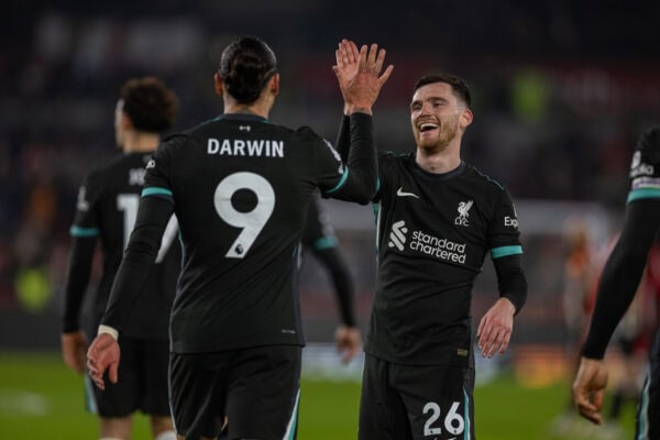 LONDON, ENGLAND - Saturday, January 18, 2025: Liverpool's Darwin Núñez (L) celebrates with team-mate Andy Robertson after scoring the second goal during the FA Premier League match between Brentford FC and Liverpool FC at the Brentford Community Stadium. Liverpool won 2-0. (Photo by David Rawcliffe/Propaganda)