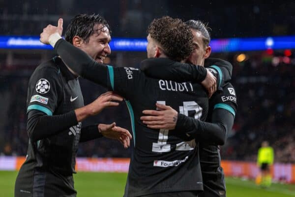 EINDHOVEN, NETHERLANDS - Wednesday, January 29, 2025: Liverpool's Harvey Elliott (C) celebrates with team-mates Federico Chiesa (L) and Kostas Tsimikas (R) after scoring the second goal during the UEFA Champions League Matchday 8 game between PSV Eindhoven and Liverpool FC at the Philips Stadion. (Photo by David Rawcliffe/Propaganda)