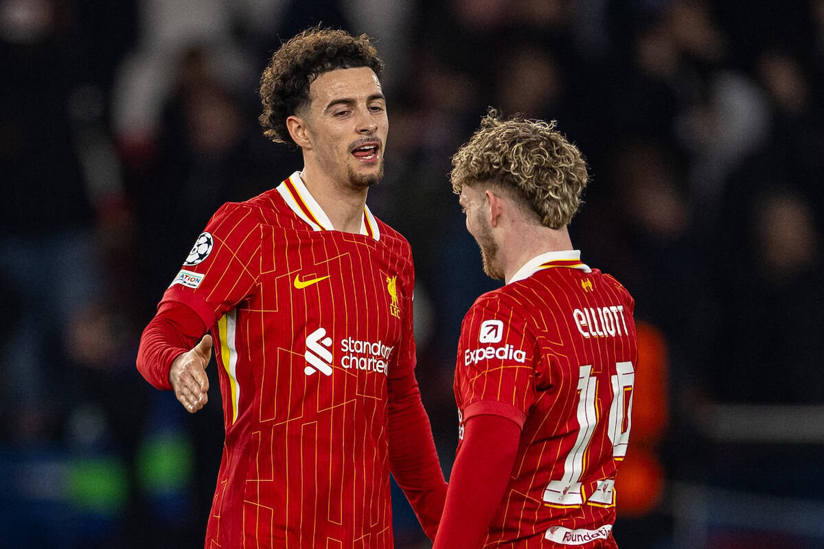 PARIS, FRANCE - Wednesday, March 5, 2025: Liverpool's Curtis Jones and Harvey Elliott (R) celebrate after the UEFA Champions League Round of 16 1st Leg game between Paris Saint-Germain and Liverpool FC at the Parc des Princes. Liverpool won 1-0. (Photo by David Rawcliffe/Propaganda)