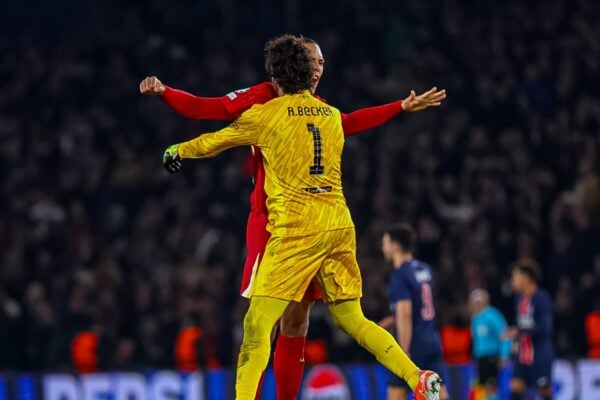 PARIS, FRANCE - Wednesday, March 5, 2025: Liverpool's captain Virgil van Dijk (L) and goalkeeper Alisson Becker celebrate their side's winning goal during the UEFA Champions League Round of 16 1st Leg game between Paris Saint-Germain and Liverpool FC at the Parc des Princes. (Photo by UEFA)