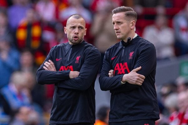 LIVERPOOL, ENGLAND - Saturday, March 8, 2025: Liverpool's assistant coach John Heitinga (L) and first team individual development coach Aaron Briggs during the FA Premier League match between Liverpool FC and Southampton FC at Anfield. Liverpool won 3-1. (Photo by David Rawcliffe/Propaganda)