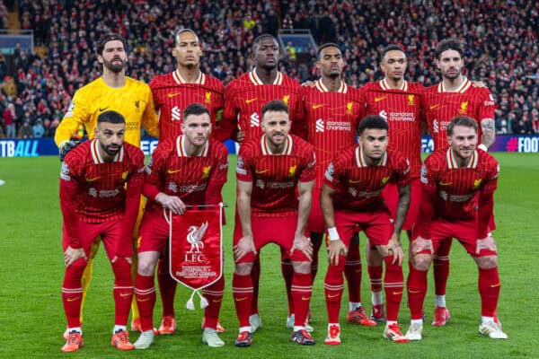 LIVERPOOL, ENGLAND - Tuesday, March 11, 2025: Liverpool players line-up for a team group photograph before the UEFA Champions League Round of 16 2nd Leg match between Liverpool FC and Paris Saint-Germain FC at Anfield. Back row L-R: goalkeeper Alisson Becker, captain Virgil van Dijk, Ibrahima Konaté, Ryan Gravenberch, Trent Alexander-Arnold, Dominik Szoboszlai. Front row L-R: Mohamed Salah, Andy Robertson, Diogo Jota, Luis Díaz, Alexis Mac Allister. (Photo by David Rawcliffe/Propaganda)