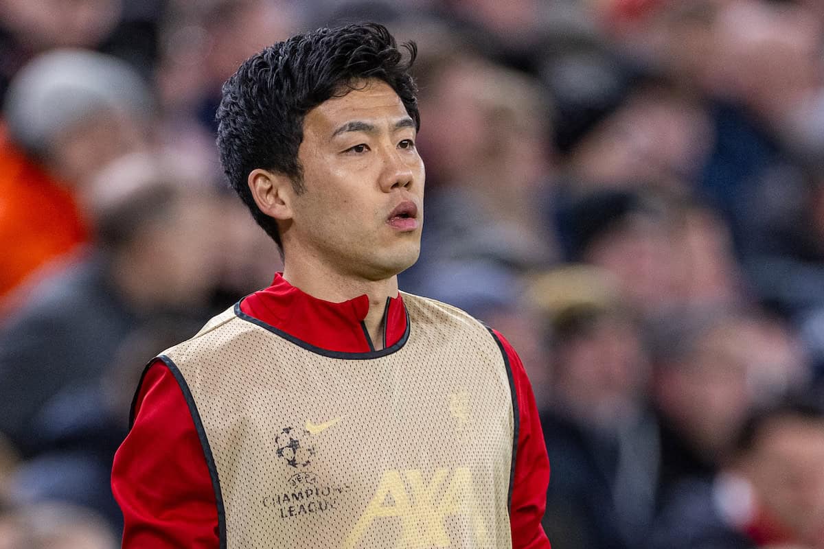 LIVERPOOL, ENGLAND - Tuesday, March 11, 2025: Liverpool's substitute Wataru Endo warms-up during the UEFA Champions League Round of 16 2nd Leg match between Liverpool FC and Paris Saint-Germain FC at Anfield. The tie ended 1-1 on aggregate, PSG won 4-1 on penalties. (Photo by David Rawcliffe/Propaganda)