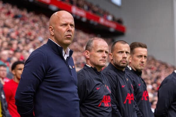 LIVERPOOL, ENGLAND - Sunday, April 13, 2025: Liverpool's head coach Arne Slot and his staff first assistant coach Sipke Hulshoff, assistant coach John Heitinga and first team individual development coach Aaron Briggs stand for a minute's silence to remember the victims of the Hillsborough Stadium Disaster ahead of the 36th Anniversary before the FA Premier League match between Liverpool FC and West Ham United FC at Anfield. Liverpool won 2-1. (Photo by David Rawcliffe/Propaganda)