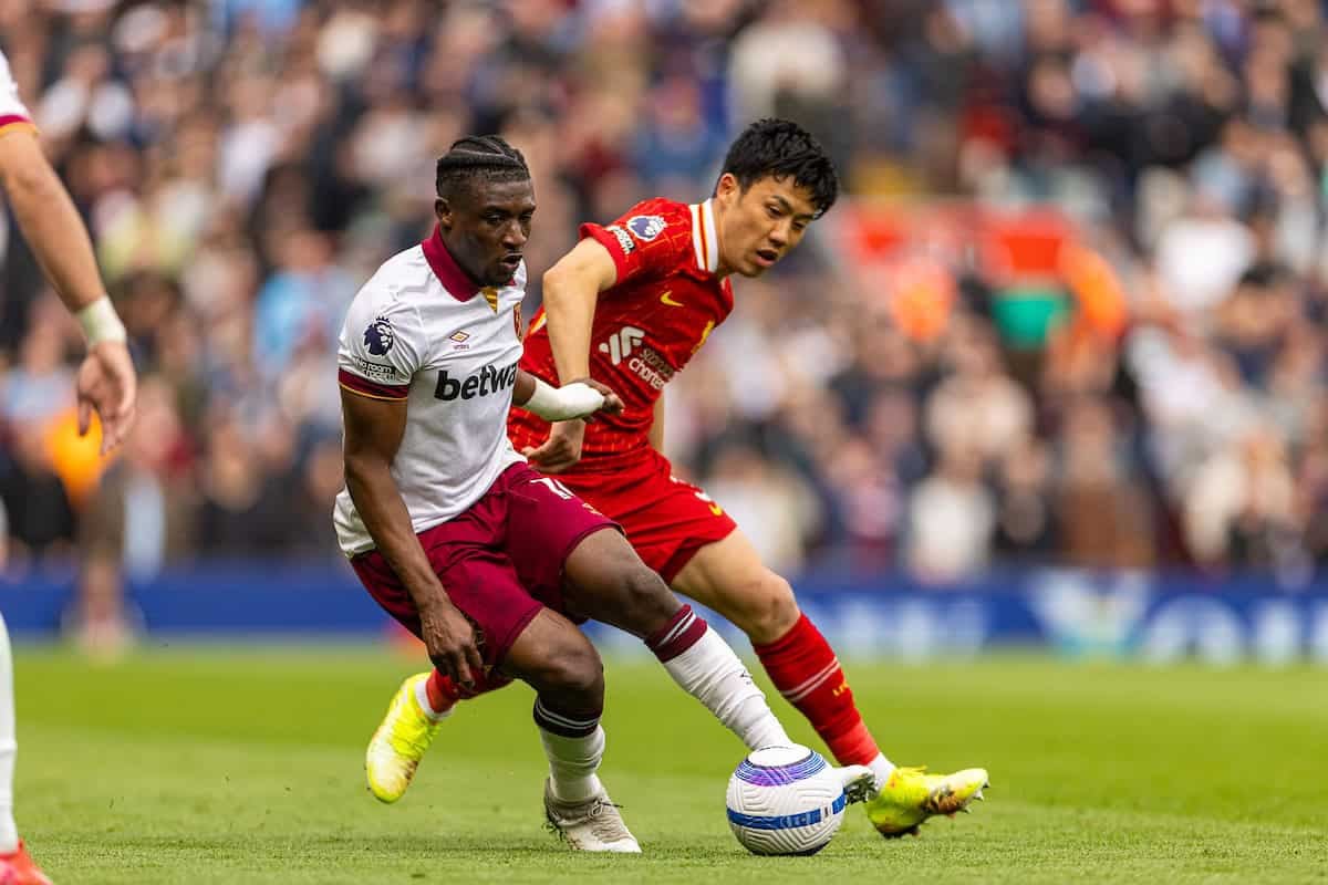 LIVERPOOL, ENGLAND - Sunday, April 13, 2025: West Ham United's Mohammed Kudus (L) is challenged by Liverpool's Wataru Endo during the FA Premier League match between Liverpool FC and West Ham United FC at Anfield. Liverpool won 2-1. (Photo by David Rawcliffe/Propaganda)