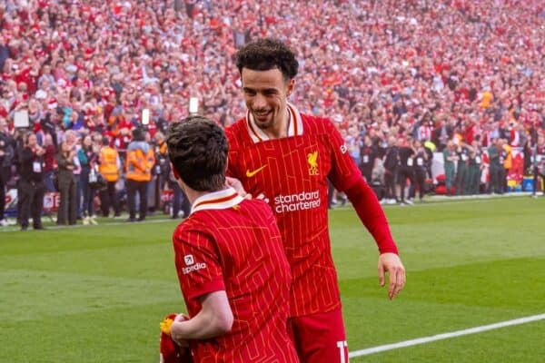 LIVERPOOL, ENGLAND - Sunday, April 27, 2025: Liverpool's Curtis Jones celebrates with supporter Harry Whitehurst after the FA Premier League match between Liverpool FC and Tottenham Hotspur FC at Anfield. Liverpool won 5-1 and became League Champions. (Photo by David Rawcliffe/Propaganda)