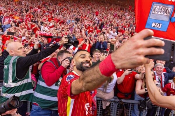 LIVERPOOL, ENGLAND - Sunday, April 27, 2025: Liverpool's Mohamed Salah takes a selfie for a supporter after winning the League Title after the FA Premier League match between Liverpool FC and Tottenham Hotspur FC at Anfield. Liverpool won 5-1. (Photo by David Rawcliffe/Propaganda)