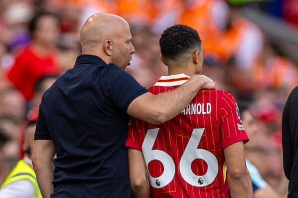 LIVERPOOL, ENGLAND - Sunday, May 11, 2025: Liverpool's head coach Arne Slot puts an arm around substitute Trent Alexander-Arnold as he prepares to bring him on during the FA Premier League match between Liverpool FC and Arsenal FC at Anfield. The game ended in a 2-2 draw. (Photo by David Rawcliffe/Propaganda)