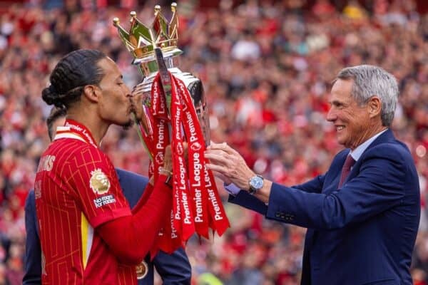 LIVERPOOL, ENGLAND - Sunday, May 25, 2025: Liverpool's Virgil van Dijk is kisses the trophy after being presented it by former Liverpool captain Alan Hansen, as the Reds celebrate being crowned Champions for the 20th time, during the FA Premier League match between Liverpool FC and Crystal Palace FC at Anfield. (Photo by David Rawcliffe/Propaganda)
