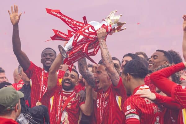 LIVERPOOL, ENGLAND - Sunday, May 25, 2025: Liverpool's Mohamed Salah and Kostas Tsimikas lift the trophy, as the Reds celebrate being crowned Champions for the 20th time, during the FA Premier League match between Liverpool FC and Crystal Palace FC at Anfield. (Photo by David Rawcliffe/Propaganda)