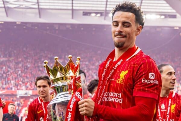 LIVERPOOL, ENGLAND - Sunday, May 25, 2025: Liverpool's Curtis Jones (L) and Trent Alexander-Arnold with the trophy, as the team celebrate becoming Champions for the 20th time, after the FA Premier League match between Liverpool FC and Crystal Palace FC at Anfield. (Photo by David Rawcliffe/Propaganda)