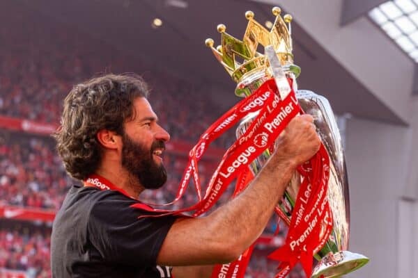 LIVERPOOL, ENGLAND - Sunday, May 25, 2025: Liverpool's goalkeeper Alisson Becker lifts the trophy, as the team celebrate becoming Champions for the 20th time, after the FA Premier League match between Liverpool FC and Crystal Palace FC at Anfield. (Photo by David Rawcliffe/Propaganda)