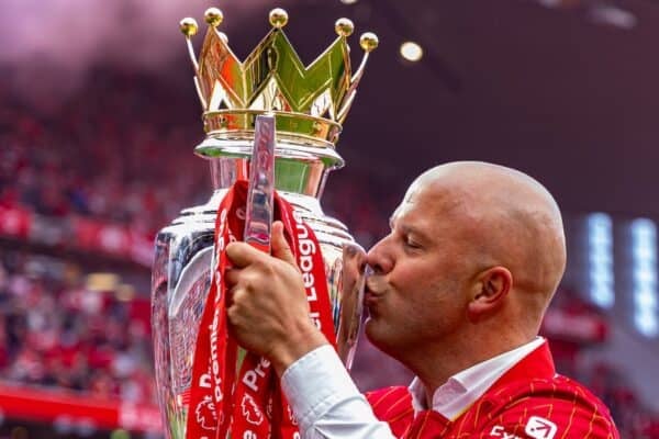 LIVERPOOL, ENGLAND - Sunday, May 25, 2025: Liverpool's head coach Arne Slot kisses the trophy, as the team celebrate becoming Champions for the 20th time, after the FA Premier League match between Liverpool FC and Crystal Palace FC at Anfield. (Photo by David Rawcliffe/Propaganda)